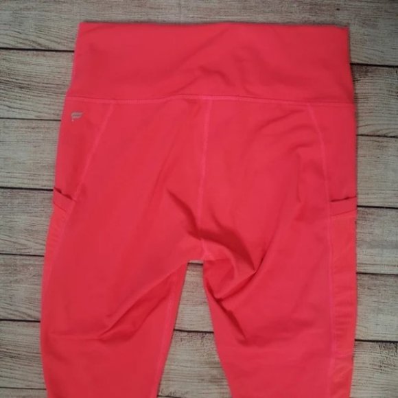 Fabletics On-the-Go High-Waisted Capri in Pop Coral - Picture 6 of 12